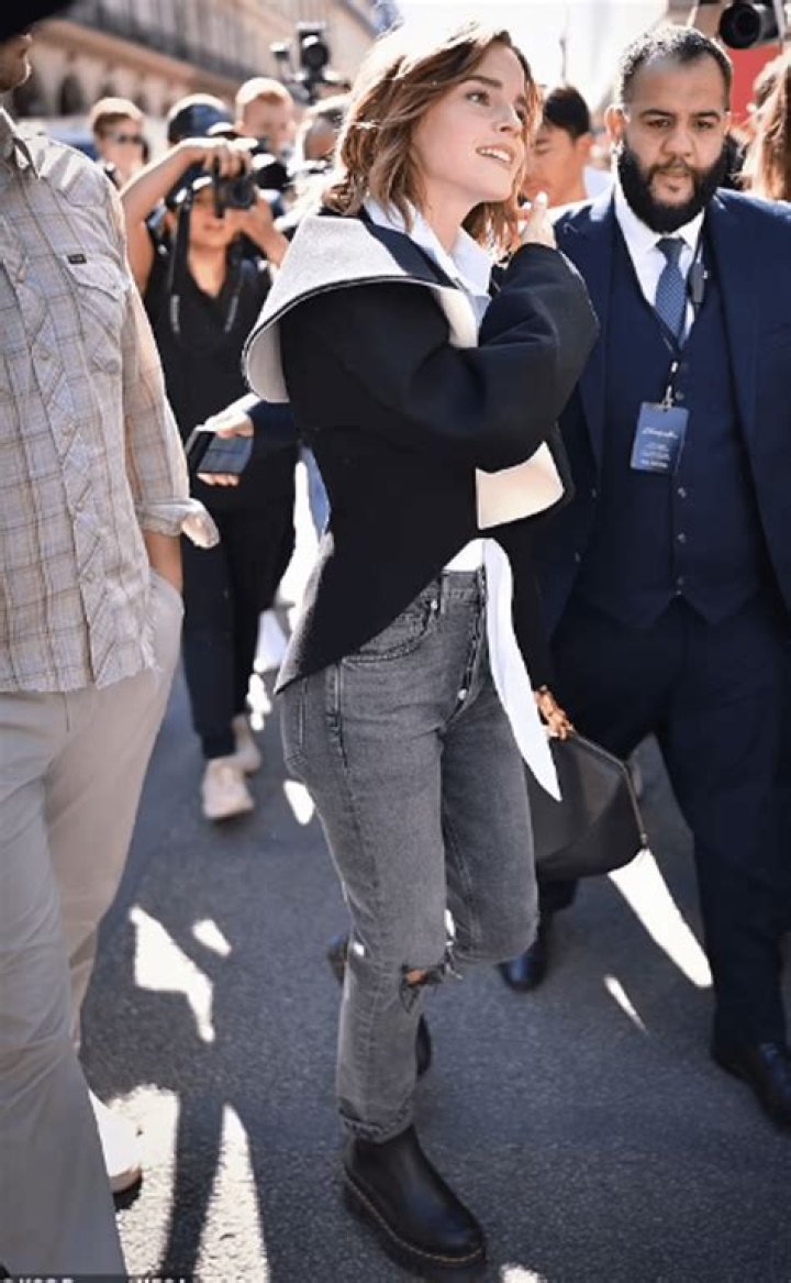 Emma Watson came to the Schiaparelli show in ripped jeans and a designer jacket
