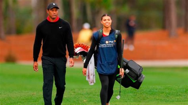 How long did Billy Foster caddie for Tiger Woods?