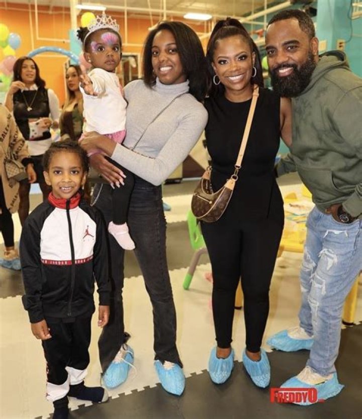 Kandi Burruss Posts Sweet Family Vacation Photos With Husband Todd Tucker, Son Ace; But Baby Blaze Made A Big Impression In A Green Bathing Suit And Matching Shades