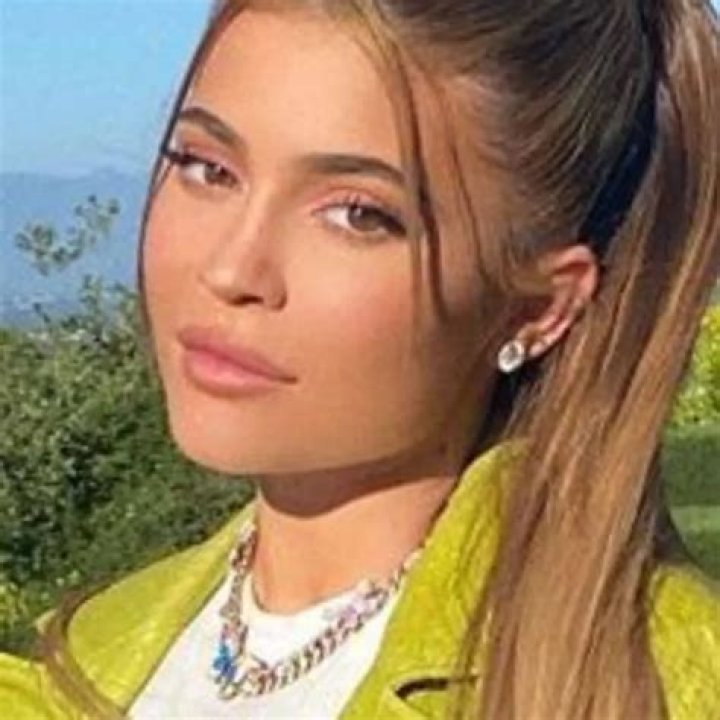 Kylie Jenner Dazzled In A Lime Green Ostrich Effect Leather Coat