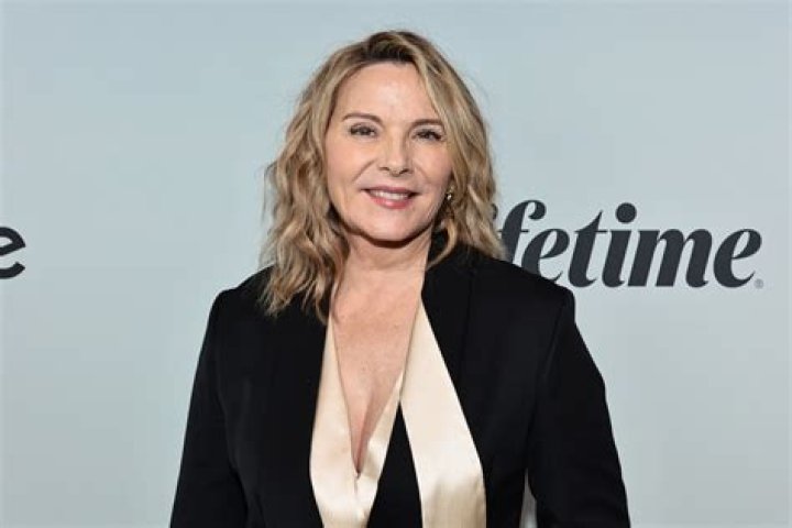 Kim Cattrall in Bathing Suit Says "Keep Movin'" — Celebwell