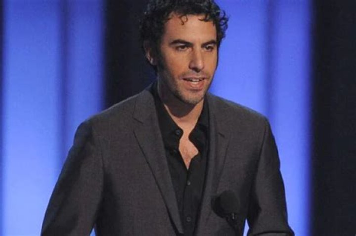 Sacha Baron Cohen Invades Political Activist Event And Sings ‘Racist’ Song