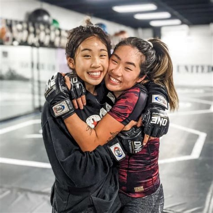 Who is Angela Lee father Ken Lee?